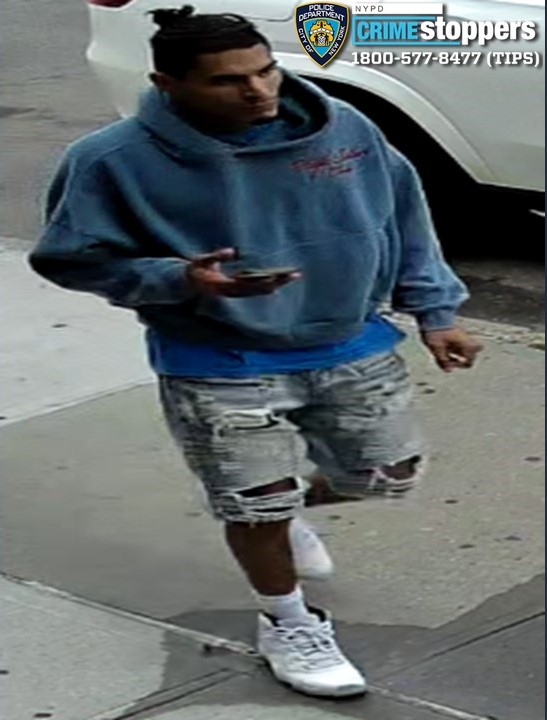Cops are looking for the suspect who allegedly rammed his victim with a car before beating him in Astoria.