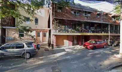 Police from the 110th Precinct were called to the scene of the murder after a first-floor resident found the victim in a cellar stairwell in a pool of blood.