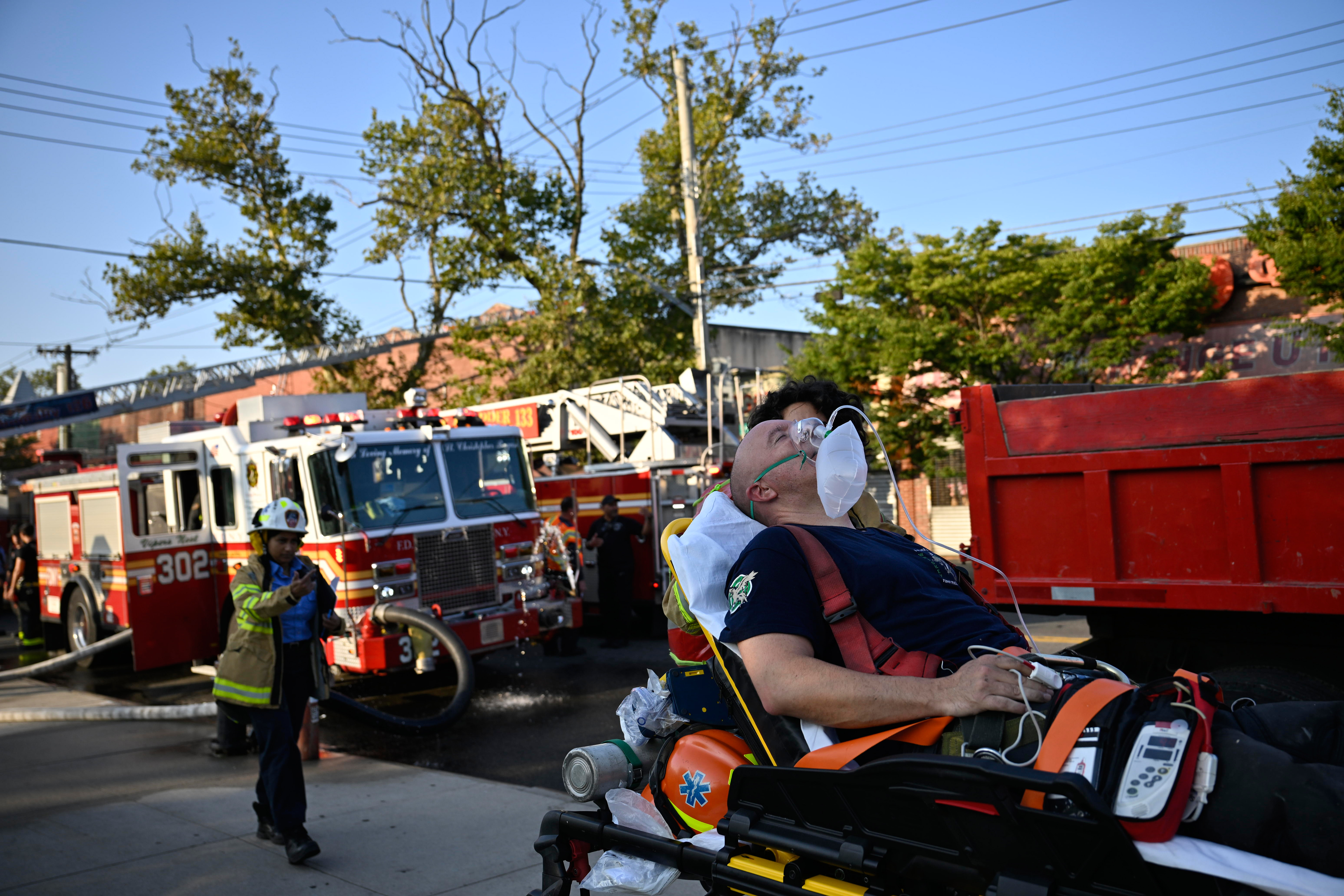 Three firefighters were injured while battled a raging four alarm fire in a row of two-story mixed use buildings on Aug. 10 at 114-42 through 114-48 Stuphin Blvd. in South Jamaica.