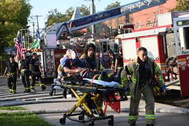 Three firefighters were injured while battled a raging four alarm fire in a row of two-story mixed use buildings on Aug. 10 at 114-42 through 114-48 Stuphin Blvd. in South Jamaica.