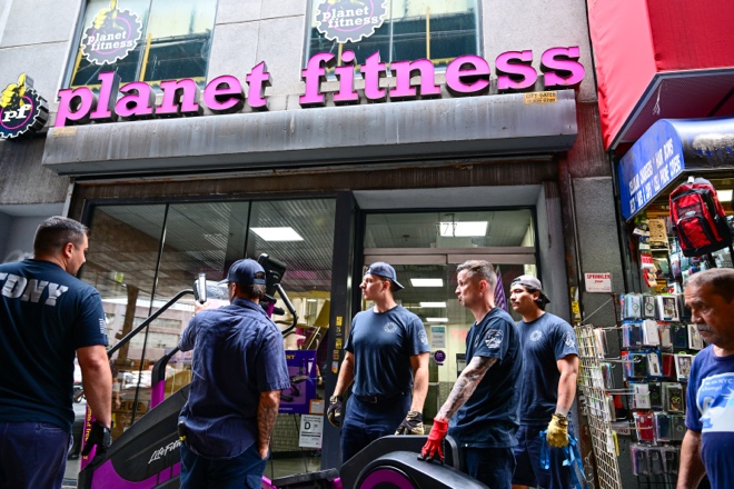 FDNY removes cardio and strength-training machines from the Planet Fitness in Bushwick, Brooklyn.