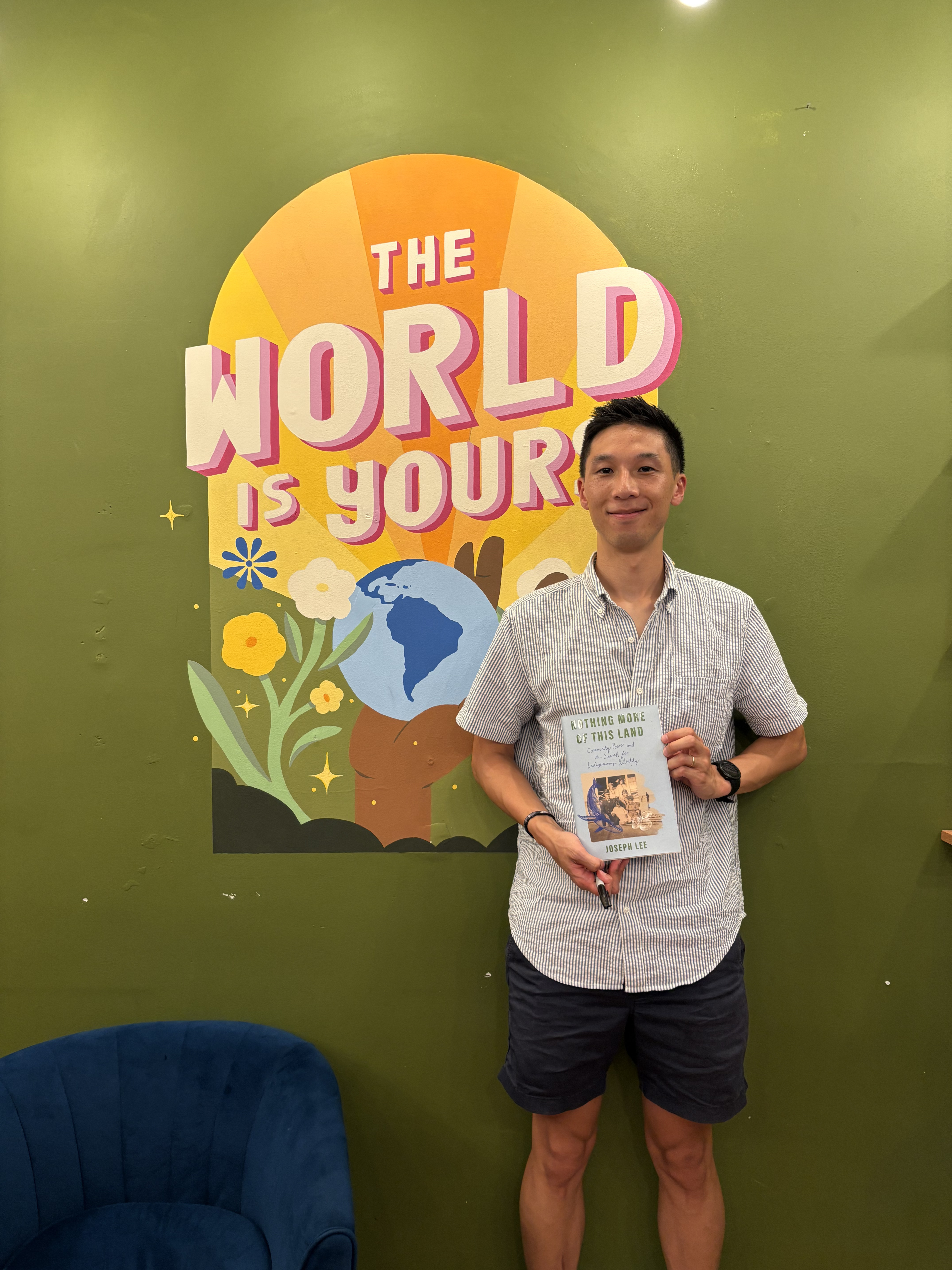 Joseph Lee, the author of debut book "Nothing More of This Land: Community, Power, and the Search for Indigenous Identity," at The World's Borough Bookshop in Jackson Heights.