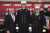 Chaplain Peter Purpura is flanked by FDNY Commissioner Robert Tucker and Chief of Department John Esposito..