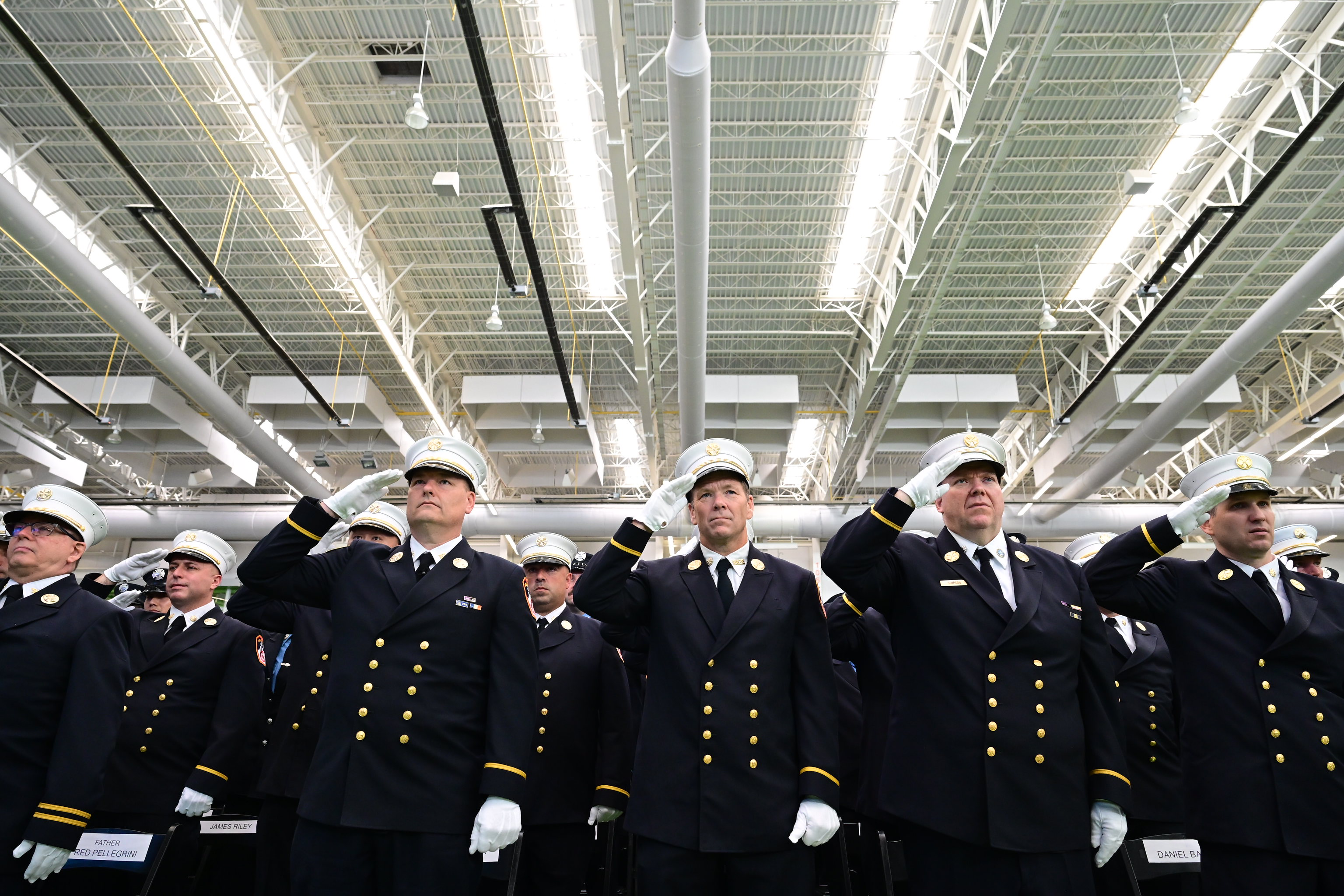 Peter Purpura, a Middle Village priest, was among the 83 members of the FDNY to be promoted in the ranks at a ceremony on Staten Island last month.