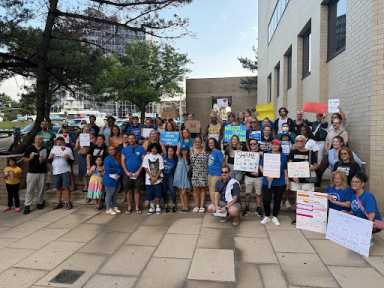 CEC 30 held a rally last month calling for Ashley Rzonca to be reinstated to her position as UFT representative for School District 30. Photo courtesy of Whitney Toussaint.