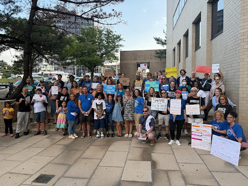 CEC 30 held a rally last month calling for Ashley Rzonca to be reinstated to her position as UFT representative for School District 30. Photo courtesy of Whitney Toussaint.