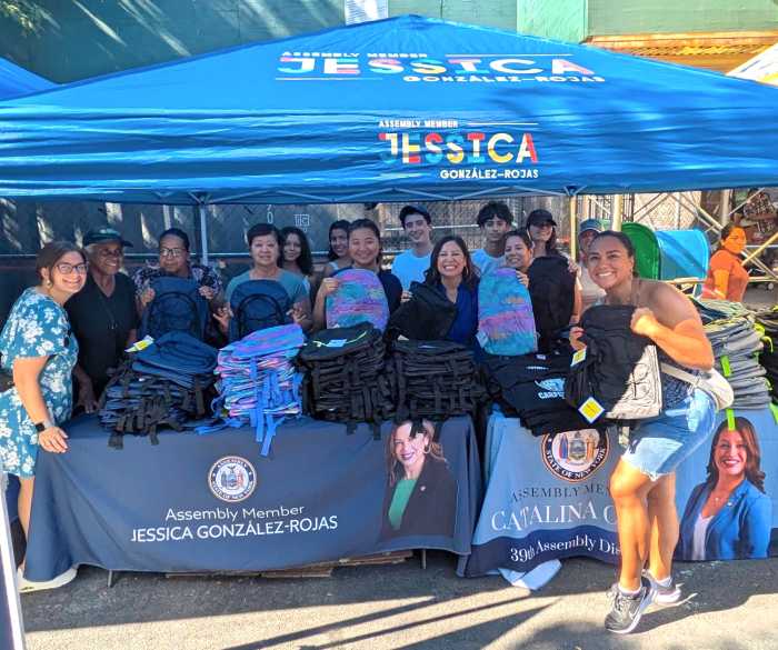 Assembly Member Jessica González-Rojas poses with staff members and volunteers at the Corona backpack giveaway. Photo courtesy of Assembly Member Jessica González-Rojas.