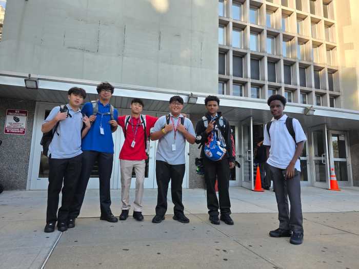 Max Carabbo (center, gray shirt) with his friends outside St. Francis Prep. Photo: Shane O'Brien