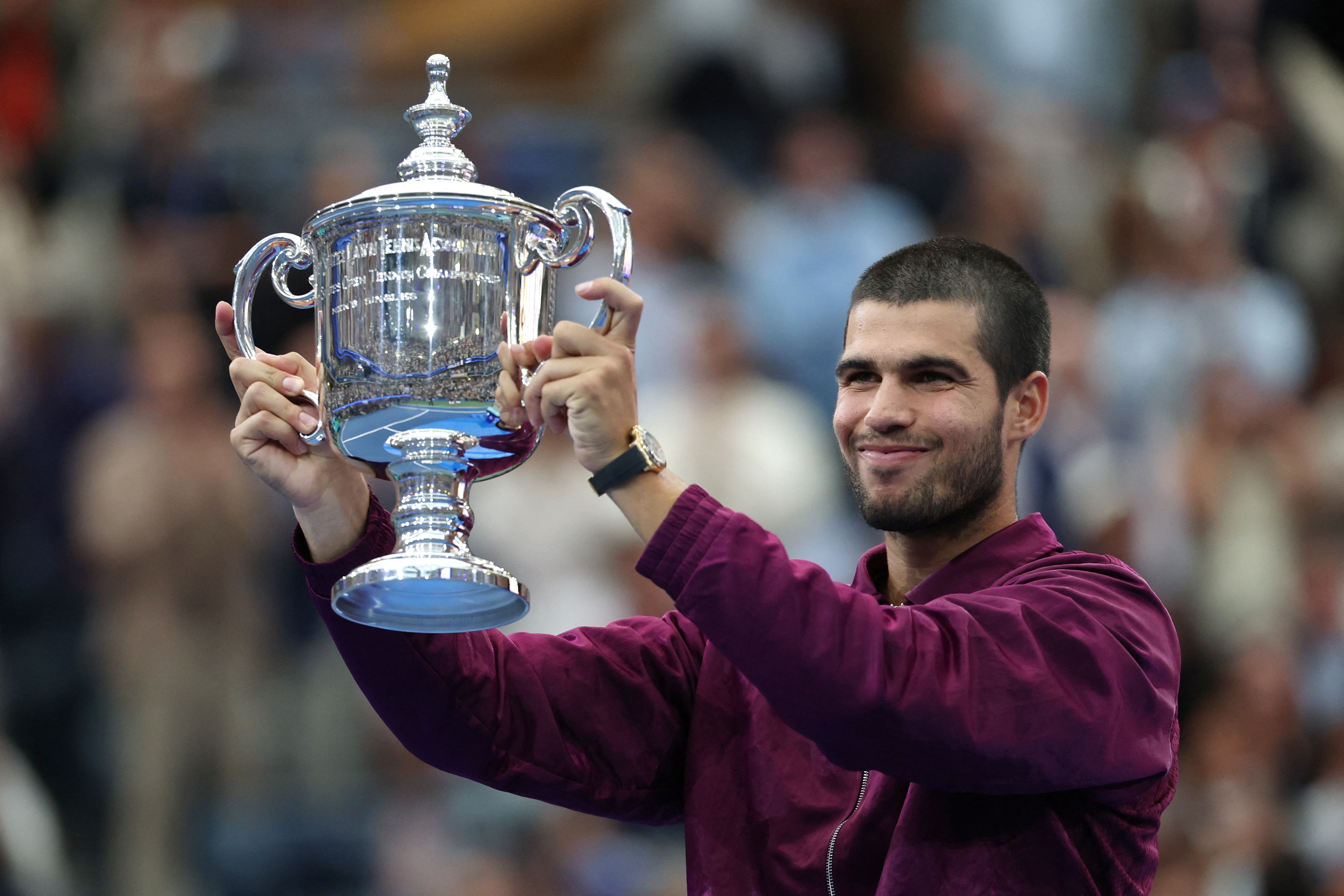 Tennis – U.S. Open – Flushing Meadows, New York, United States – September 7, 2025 Spain’s Carlos Alcaraz celebrates with the trophy after winning the men’s singles final.