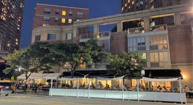American-Brass-outdoor-dining-at-nightime-Michael-Dorgan-Queens-Post_c356a4