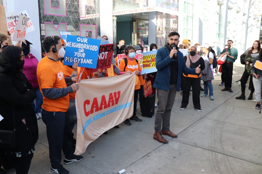 Assemblymember Zohran Mamdani speaking at the protest Wednesday (Photo by Michael Dorgan, Queens Post)