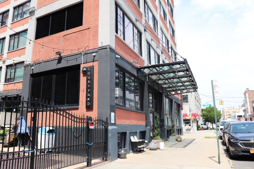 A Long Island City Hotel called The Paper Factory has been converted into a shelter to house economic migrants (Photo by Michael Dorgan)
