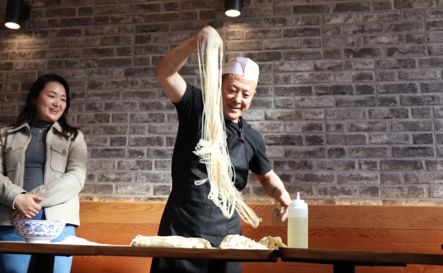 Chef Nie of Dun Huang at LIC Partnership Lunar New Year Event (Photo by Michael Dorgan, Queens Post)