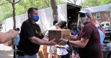 Offloading-truck-Michael-Dorgan-Queens-Post