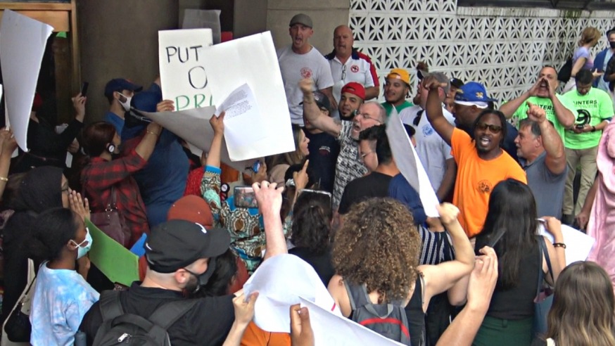 Protestors clash outside the Astoria World Manor Tuesday ahead of the CB1 meeting (Photo: Michael Dorgan, Queens Post)