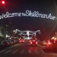 Previous Christmas lights span Skillman Avenue. File photo.