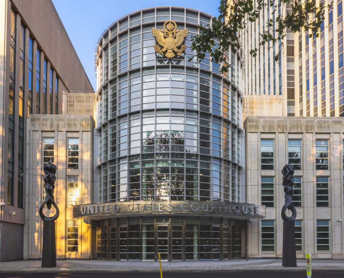 A former NYPD officer from Bellerose was sentenced in Brooklyn federal court to three years in prison for defrauding millions of dollars from investors.