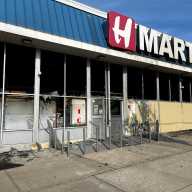 The FDNY battled a three-alarm fire at the H Mart on Union Street in Flushing and inspectors from the city's Department of Building issued a full vacate order due to the fire damage.