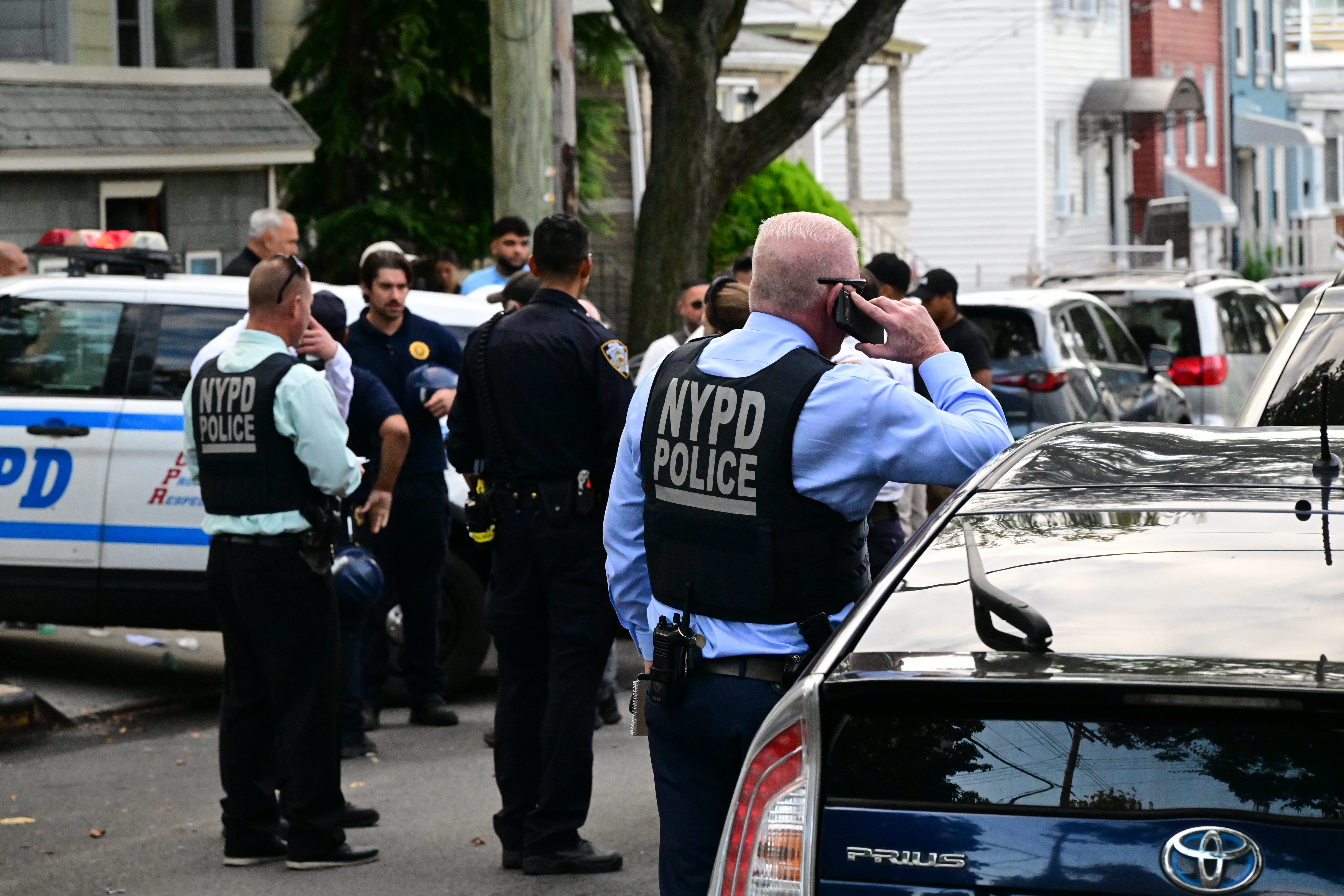Detectives from the 109th Precinct and FDNY fire marshals were on the scene of a two-alarm house fire in College Point on Sept. 12 that injured five residents.