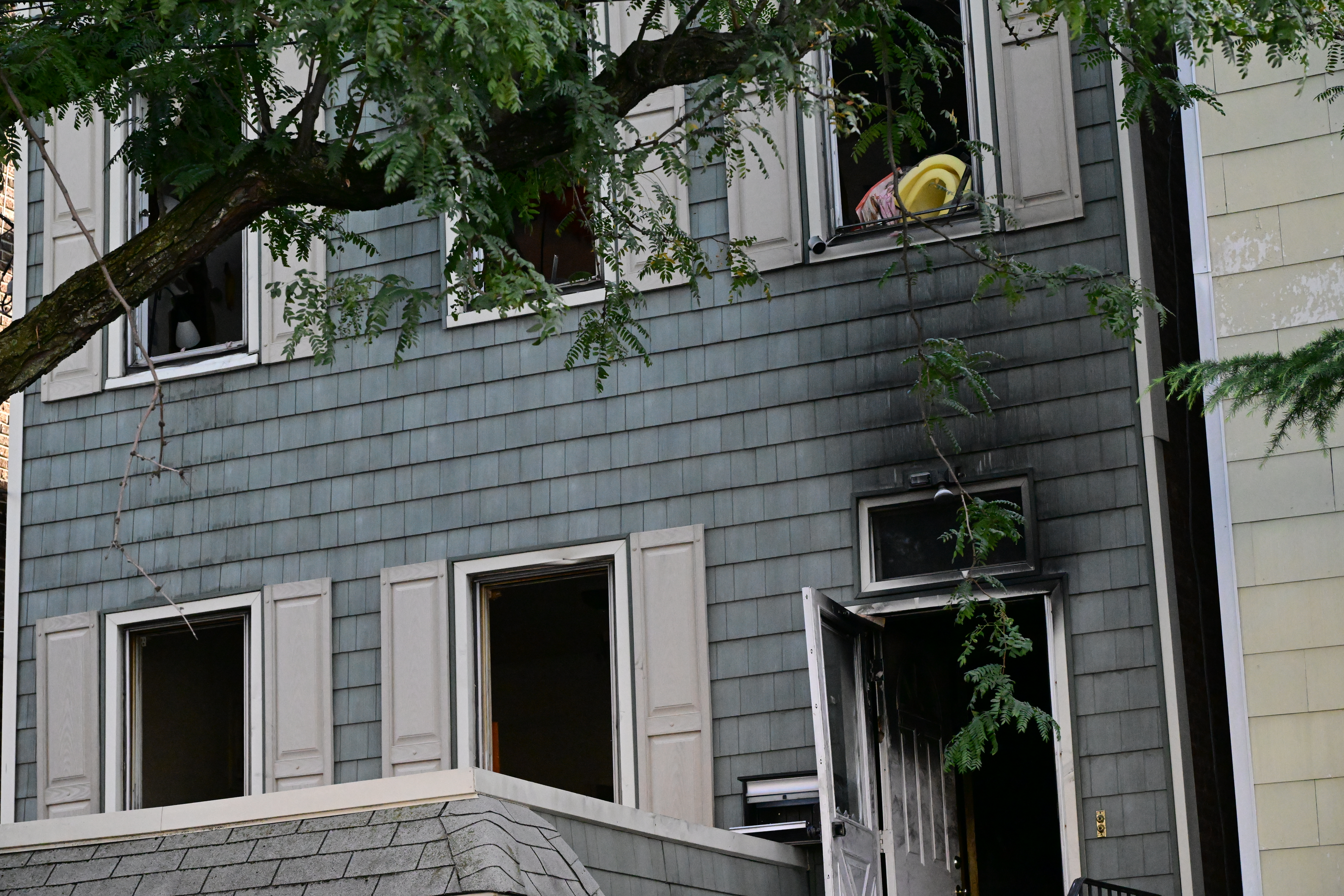 Detectives from the 109th Precinct and FDNY fire marshals were on the scene of a two-alarm house fire in College Point on Sept. 12 that injured five residents.