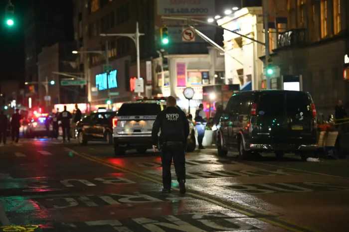 Police at the scene in Jamaica, where a shootout between police and an armed robbery suspect on Nov. 19, 2024 ended with the perpetrator dead and an officer wounded.