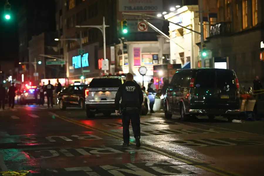 Police at the scene in Jamaica, where a shootout between police and an armed robbery suspect on Nov. 19, 2024 ended with the perpetrator dead and an officer wounded.