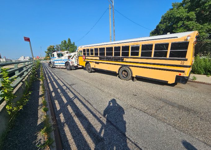 Officers towed away an old abandoned bus that was discovered in Maspeth.