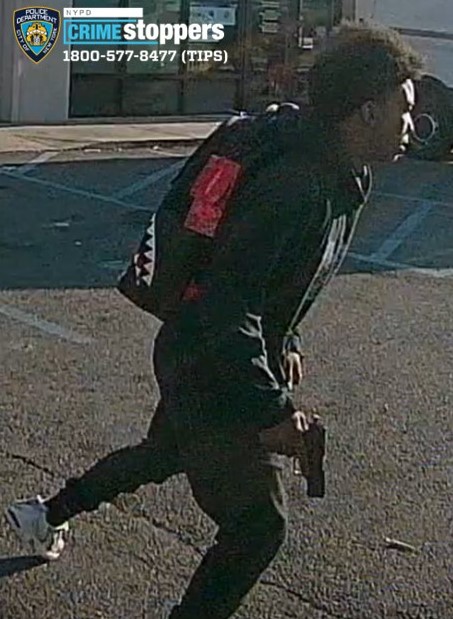 The teenager surrendered, accompanied by his attorney, a day after the NYPD circulated surveillance images of him running from the scene of the crime holding a firearm.