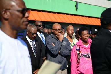 The Southeast Queens community held a prayer vigil for 13-year-old Sanjay Samuel in the Cambria Heights parking lot, where he was allegedly gunned down by a 16-year-old South Jamaica boy.