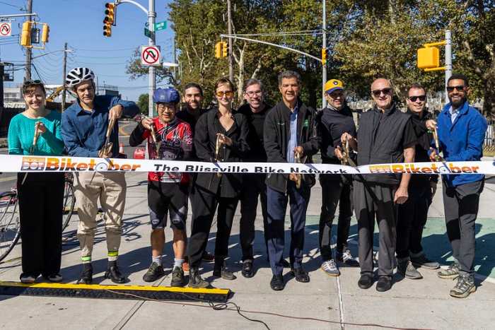 DOT Commissioner Ydanis Rodriguez cuts the ribbon on the first phase of the Blissville Bike Network as part of the DOT's Biketober celebrations. Photo: DOT Flickr.