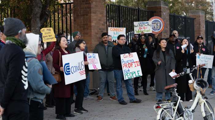 Won and LIC residents protest outside Con Edison on Tuesday evening. Photo via office of Council Member Julie Won.