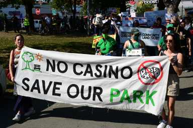 Protesters voiced their concerns about the proposed Metropolitan Park development at Corona Plaza on Sunday afternoon. Photo: Ramy Mahmoud.