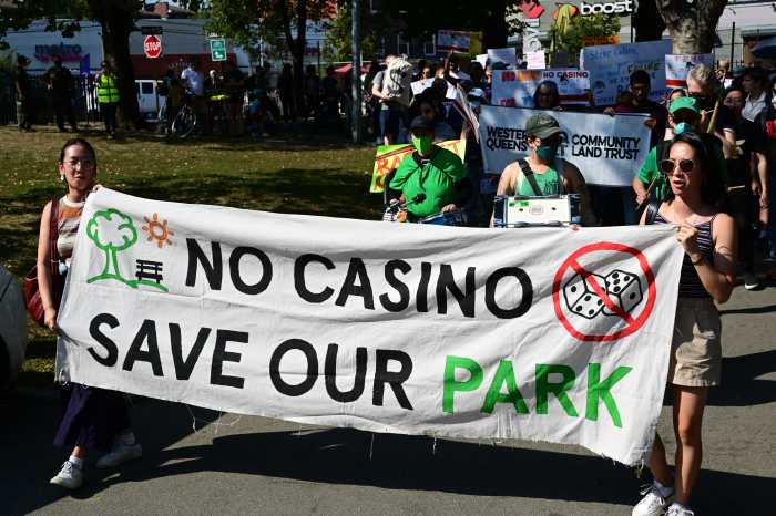 Protesters voiced their concerns about the proposed Metropolitan Park development at Corona Plaza on Sunday afternoon. Photo: Ramy Mahmoud.