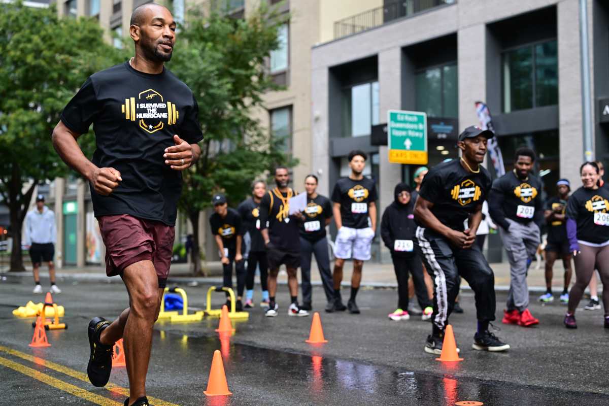 LIC Wellness Fest found Rodney and Brandon Carter at Saturday's event on 44th Drive. Photo: Ramy Mahmoud.