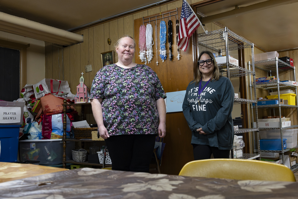 Tara Bear and Gina Lehman pose for a photo at the Sacred Heart Food Pantry in Glendale on Oct. 6, 2025.