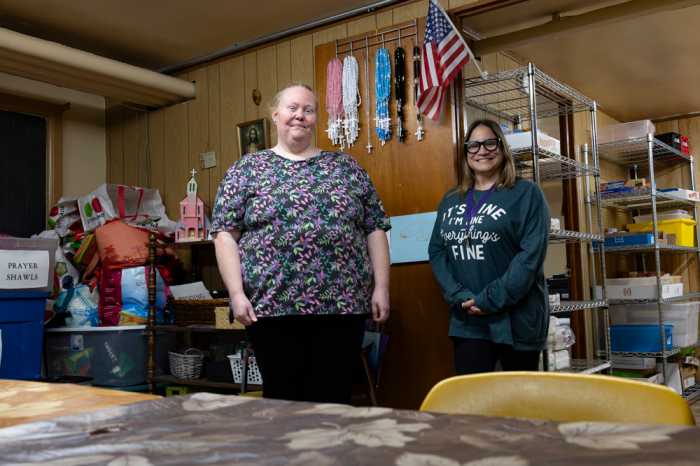 Tara Bear and Gina Lehman pose for a photo at the Sacred Heart Food Pantry in Glendale on Oct. 6, 2025.