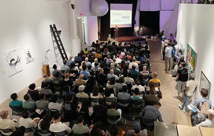 Attendees at a previous Queens Tech Night event. Image via QEDC.