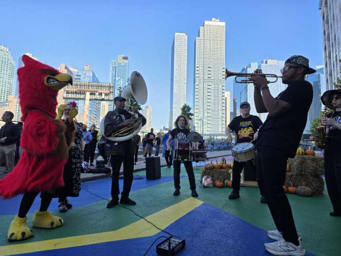 The Honks Family Band celebrates the opening of the new 29th Street Plaza by LaGuardia Community College. Photo: Shane O'Brien.