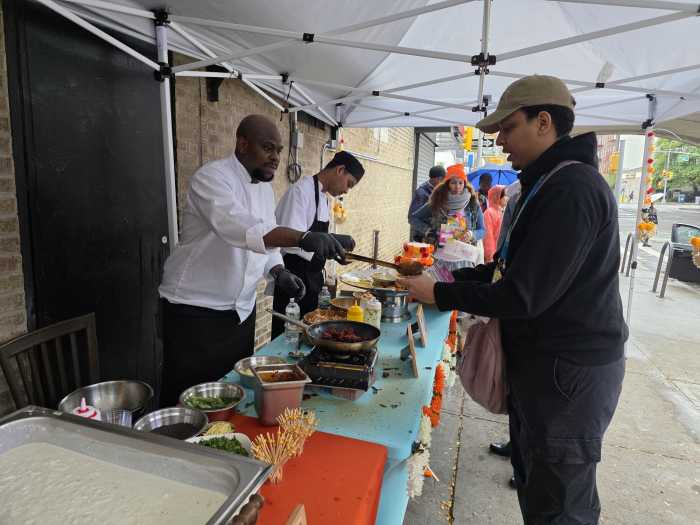 Cardamom offered a sample of "Chicken 46" during the event. Photo: Shane O'Brien.