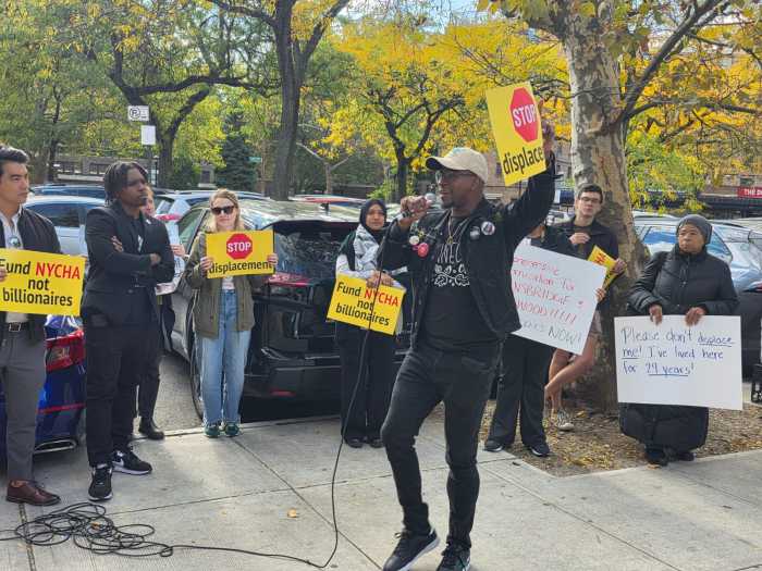 Protesters rallied against the OneLIC Plan at the Jacob A. Riis Neighborhood Settlement on Thursday. Photo: Shane O'Brien.