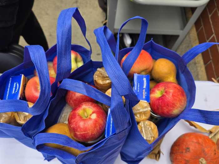 Groceries available at the weekly distribution include fruit, vegetables and pasta. Photo by Shane O'Brien.