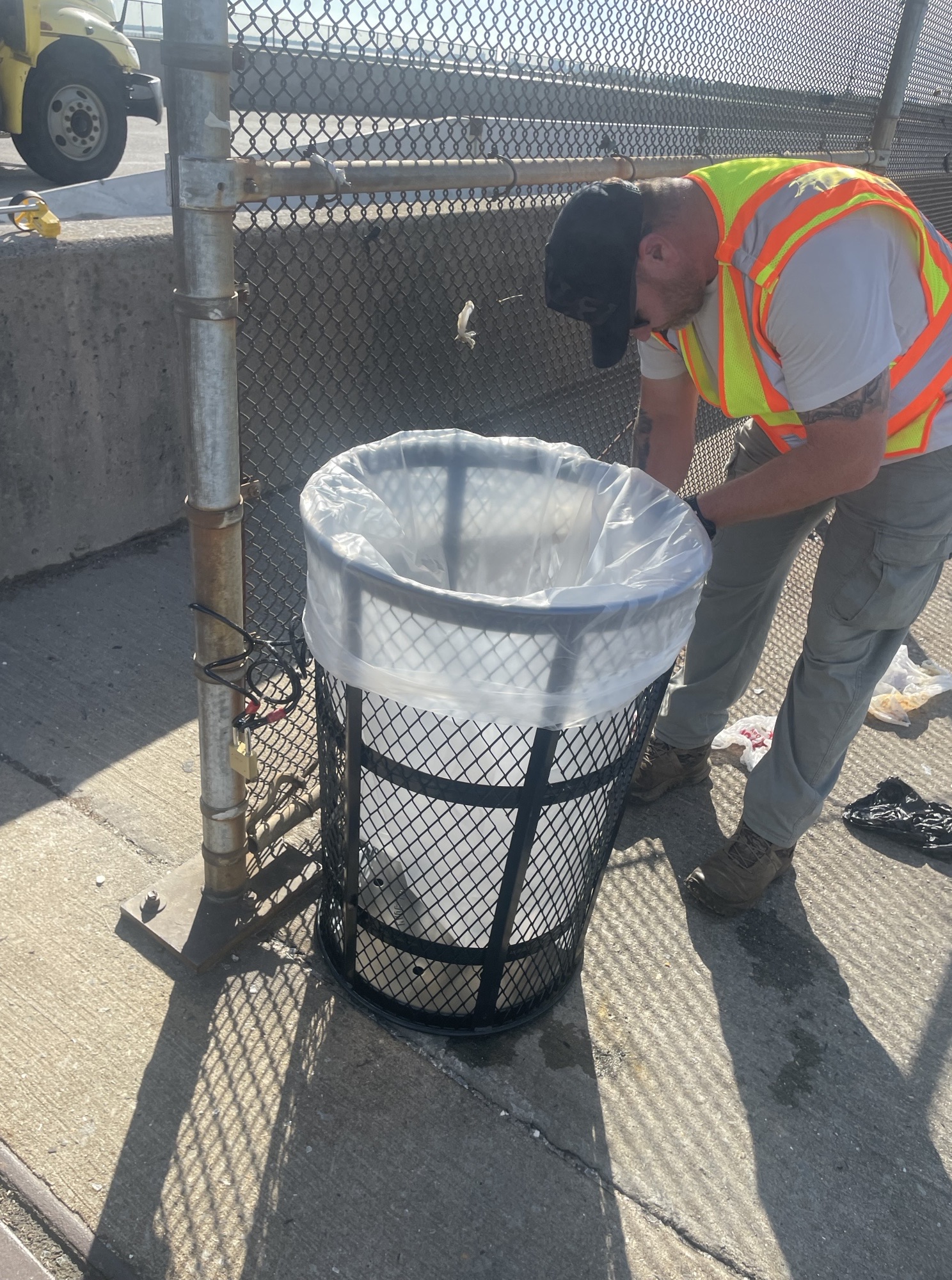 The NYS DOT installed a dozen new trash cans along the span over Jamaica Bay.