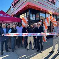 Representatives from Briarwood Dunkin’, Metro Franchising, the Viscardi Center, the Queens Chamber of Commerce and the Office of New York State Senator Leroy Comrie celebrated the grand reopening of the Dunkin’ restaurant on Queens Boulevard, in Briarwood, on Oct. 16.