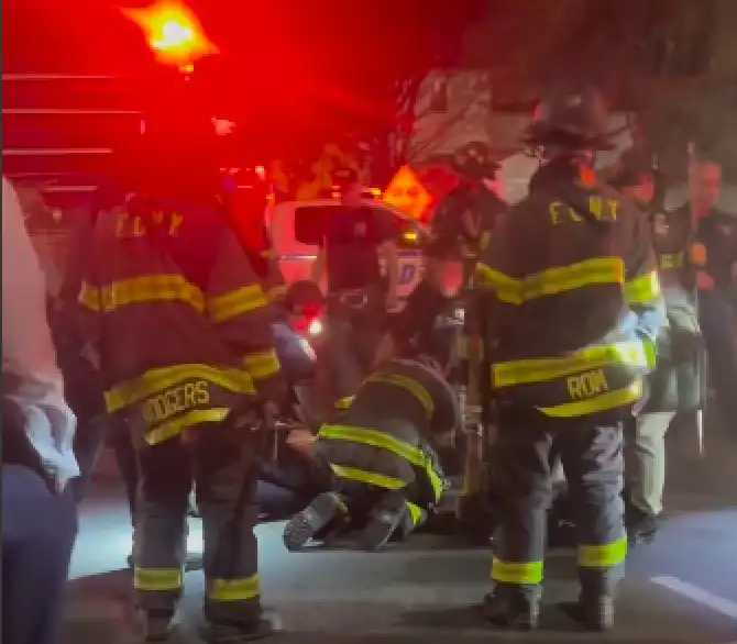 Emergency responders worked to extricate a pedestrian who was trapped beneath a vehicle that struck him on Linden Boulevard in South Jamaica on April 24. The man was pronounced dead the next day.