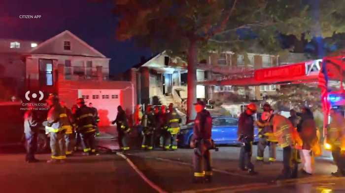 An 85-year-old woman was killed and two firefighters were hurt in a house fire in College Point on Monday, Oct. 27.