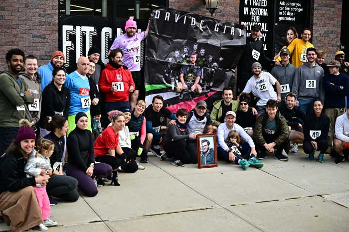 5K for Davide participants pay tribute to Davide Giri in Astoria on Saturday, Nov. 15.