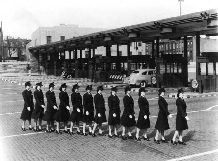 Twelve women, appointed temporary toll collectors during World War II, report for duty at the Queens Midtown Tunnel. April 15, 1943. Photo by Somach Photo Service.
