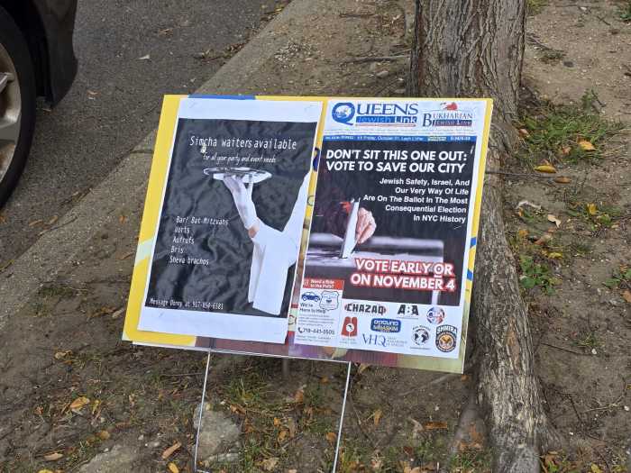 A sign encouraging Kew Gardens Hills residents to vote and "save the city." Photo by Shane O'Brien.