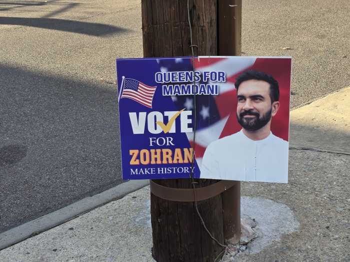 One of many signs in Jamaica Hills encouraging residents to vote for Mamdani. Photo by Shane O'Brien.