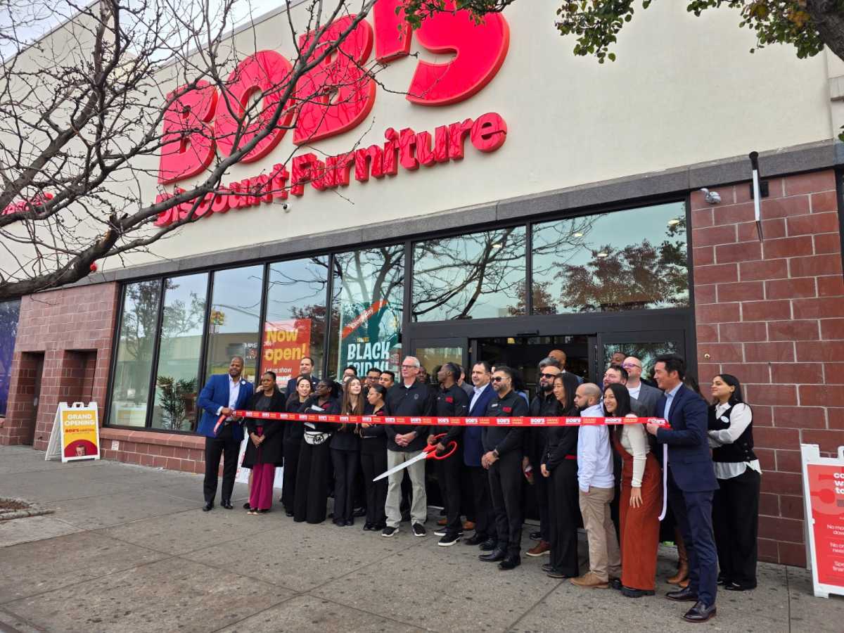 Bob's Discount Furniture celebrated its grand opening on Northern Boulevard with a ribbon-cutting ceremony Friday morning. Photo by Shane O'Brien.